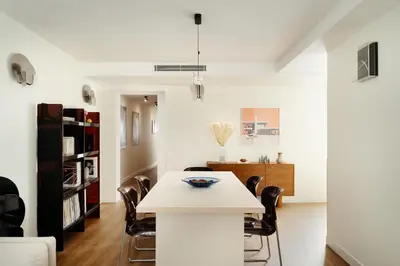 Cuisine ou kitchenette dans l'établissement Edgar Suites Marais - Temple