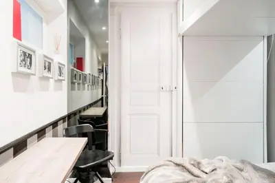 Un ou plusieurs lits dans un hébergement de l'établissement Resplendent Haussmann Design 100m2 - 2 BR
