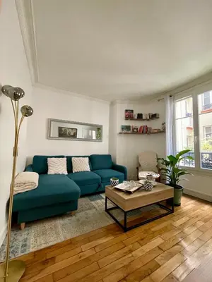 Coin salon dans l'établissement Appartement de charme à proximité des puces
