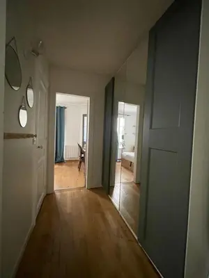 Un ou plusieurs lits dans un hébergement de l'établissement Appartement de charme à proximité des puces