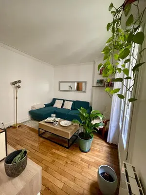 Coin salon dans l'établissement Appartement de charme à proximité des puces