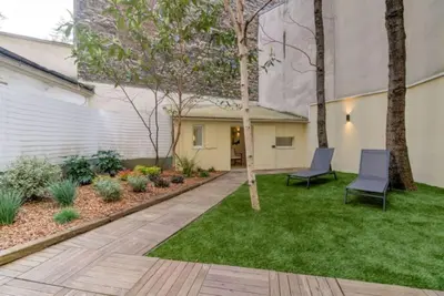 Jardin de l'établissement Jardin - Jacuzzi - chambres en suite