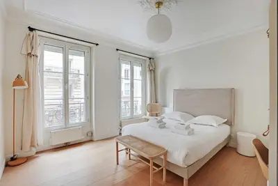 Un ou plusieurs lits dans un hébergement de l'établissement Authentic apartment - 3BR-8P - Clignancourt