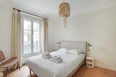 Un ou plusieurs lits dans un hébergement de l'établissement Authentic apartment - 3BR-8P - Clignancourt