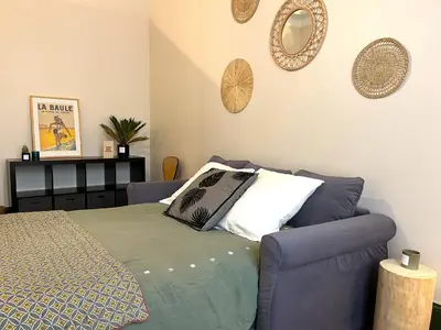 Coin salon dans l'établissement L'appartement Breteuil