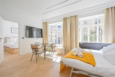 Un ou plusieurs lits dans un hébergement de l'établissement Lovely & Exclusive Parisian Flat
