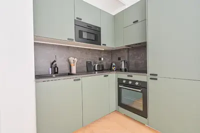 Cuisine ou kitchenette dans l'établissement Lovely & Exclusive Parisian Flat