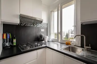 Cuisine ou kitchenette dans l'établissement Appartement spacieux aux portes de Paris