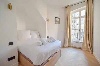 Un ou plusieurs lits dans un hébergement de l'établissement Sumptuous & Serene Parisian Flat