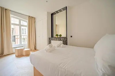 Un ou plusieurs lits dans un hébergement de l'établissement Sumptuous & Serene Parisian Flat