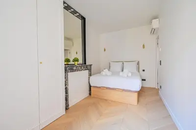 Un ou plusieurs lits dans un hébergement de l'établissement Sumptuous & Serene Parisian Flat