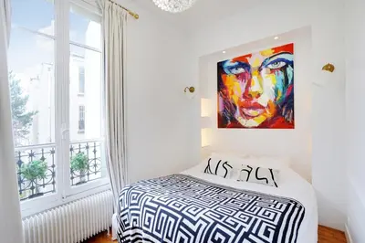Un ou plusieurs lits dans un hébergement de l'établissement Paris’Luxury : Luxe, Calm and Voluptuousness