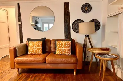 Coin salon dans l'établissement Appartement lumineux près des Galeries Lafayette