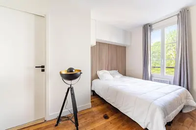 Un ou plusieurs lits dans un hébergement de l'établissement Bail mobilité - Appartement pour voyages d'affaires et d'études