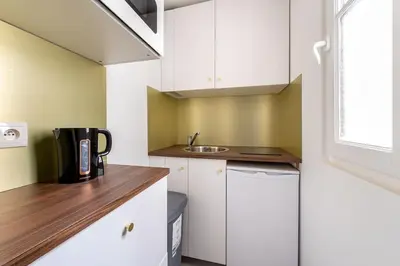 Cuisine ou kitchenette dans l'établissement Bail mobilité - Appartement pour voyages d'affaires et d'études