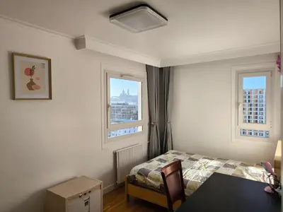 Un ou plusieurs lits dans un hébergement de l'établissement Lovely Appartment In Paris - Near Arena Porte de la Chapelle