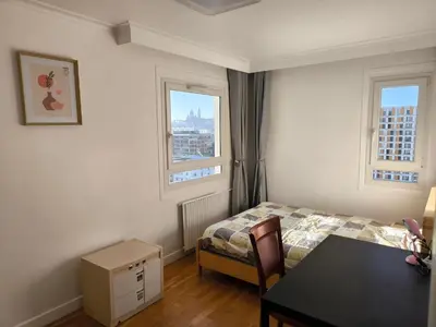 Un ou plusieurs lits dans un hébergement de l'établissement Lovely Appartment In Paris - Near Arena Porte de la Chapelle