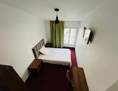 Un ou plusieurs lits dans un hébergement de l'établissement Auberge de Bagneux