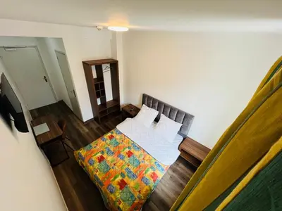 Un ou plusieurs lits dans un hébergement de l'établissement Auberge de Bagneux