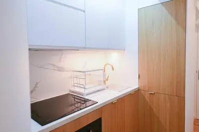 Cuisine ou kitchenette dans l'établissement We Parisian The Marais Cozy Home