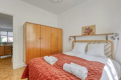 Un ou plusieurs lits dans un hébergement de l'établissement Cute Apartment in the Heart of the Latin District