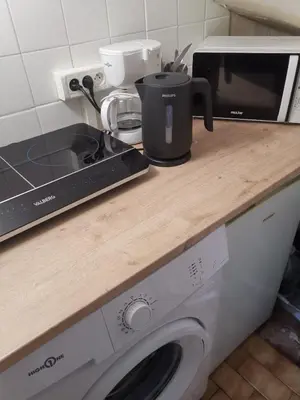 Cuisine ou kitchenette dans l'établissement Studio Asnieres sur Seine équipé et fonctionnelle