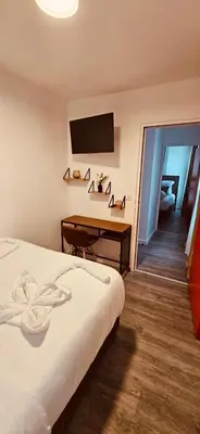 Un ou plusieurs lits dans un hébergement de l'établissement HOTEL FORMIO