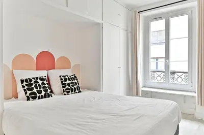 Un ou plusieurs lits dans un hébergement de l'établissement Appartement 2 pieces #TourEIffel #Invalides - II