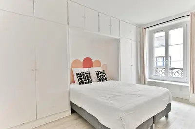 Un ou plusieurs lits dans un hébergement de l'établissement Appartement 2 pieces #TourEIffel #Invalides - II