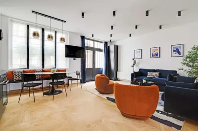 Coin salon dans l'établissement Elegant apartment - 3BR-7P - Moulin Rouge