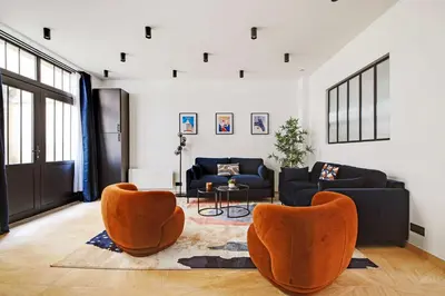 Coin salon dans l'établissement Elegant apartment - 3BR-7P - Moulin Rouge