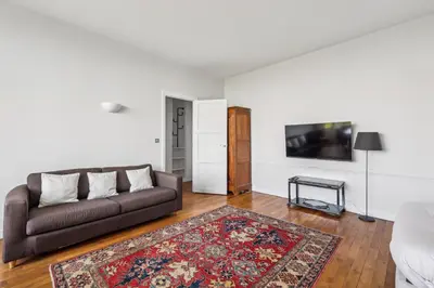 Télévision ou salle de divertissement dans l'établissement Appartement Cosy - 59 Rue Froidevaux Paris Montparnasse