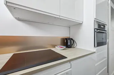 Cuisine ou kitchenette dans l'établissement Appartement Cosy - 59 Rue Froidevaux Paris Montparnasse