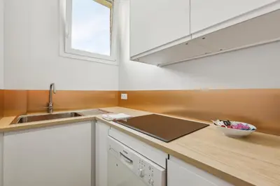 Cuisine ou kitchenette dans l'établissement Appartement Cosy - 59 Rue Froidevaux Paris Montparnasse