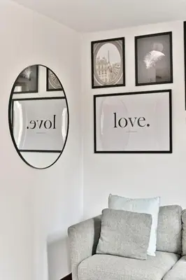 Coin salon dans l'établissement Appartement paisible et central Rivoli