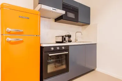Cuisine ou kitchenette dans l'établissement Cosy apartment - 1BR-4P - Marais-Place des Vosges