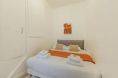 Un ou plusieurs lits dans un hébergement de l'établissement Cosy apartment - 1BR-4P - Marais-Place des Vosges