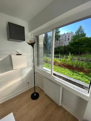 Télévision ou salle de divertissement dans l'établissement Cocoon Meridien