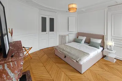 Un ou plusieurs lits dans un hébergement de l'établissement Amazing refurbished flat in Paris V