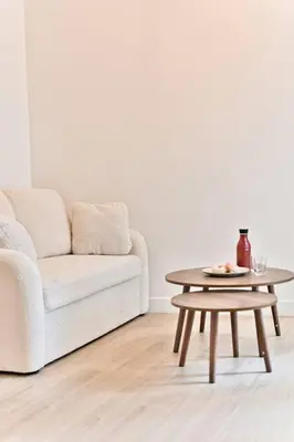 Coin salon dans l'établissement Appartement au centre de Paris - Musée Grévin
