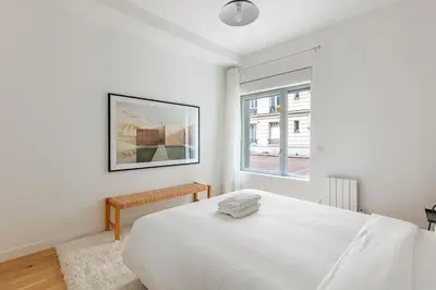 Un ou plusieurs lits dans un hébergement de l'établissement Appart 6Pers#3 Bedrooms#2 Bathrooms#Paris 19
