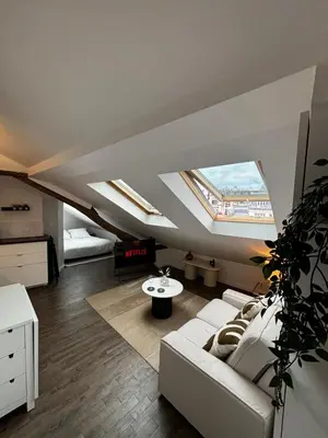 Coin salon dans l'établissement Ravissant studio parisien