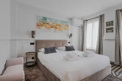 Un ou plusieurs lits dans un hébergement de l'établissement Charming apartment - 1BR-4P - Arc de triomphe