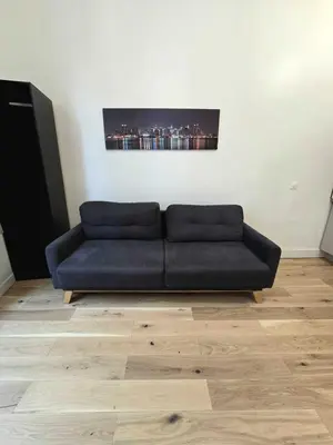 Coin salon dans l'établissement Appartement Bonne Nouvelle