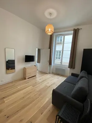 Télévision ou salle de divertissement dans l'établissement Appartement Bonne Nouvelle