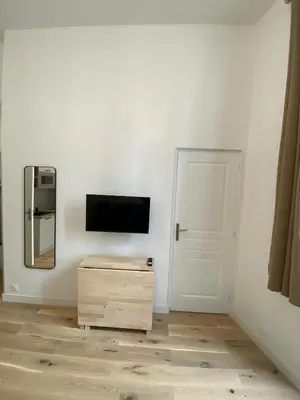 Télévision ou salle de divertissement dans l'établissement Appartement Bonne Nouvelle