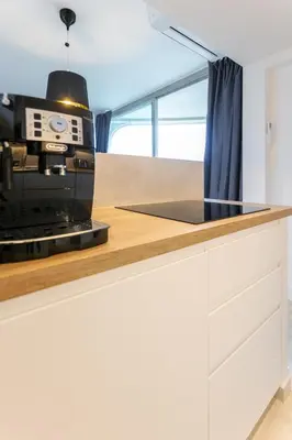 Cuisine ou kitchenette dans l'établissement Comfortion Norma - Suite de luxe avec vue sur la Tour Eiffel