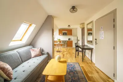Coin salon dans l'établissement Apartments Du Louvre - Le Marais