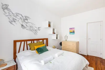 Un ou plusieurs lits dans un hébergement de l'établissement GuestReady - Elegance in trasbourg-Saint-Denis