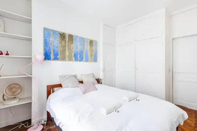 Un ou plusieurs lits dans un hébergement de l'établissement GuestReady - Elegance in trasbourg-Saint-Denis